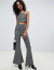 ユニークトゥエンティワン レディース カジュアルパンツ ボトムス Unique 21 print high waist jersey flare PANTS Black animal print