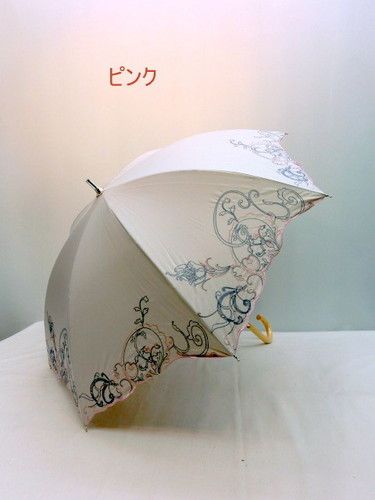 晴雨兼用傘・長傘−婦人全天候型晴雨兼用スライド式サラサエッジ柄手開き傘