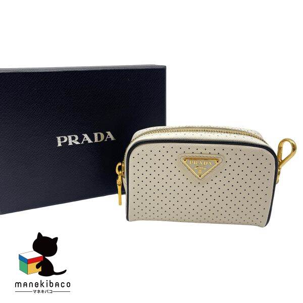 楽天manekibacoプラダ PRADA ホワイト パンチング ポーチ 白 レザー ゴールド金具 小物入れ 化粧ポーチ コンパクト ミニ バッグ 可愛い おしゃれ ブランド ファッション小物 プレゼント ギフト レディース 美品 箱 布袋 ランクS 女性用バッグ 【中古】