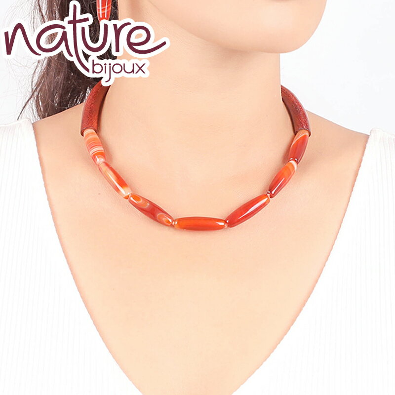 about Nature bijoux/ナチュール ビジュー... Nature bijoux/ナチュール ビジューとは、1982年にフランスで設立されたコスチューム・ジュエリーブランドです。 フランス人デザイナー・ジャン＝ダニエル・クリスチャンによる、自然素材と天然石を使い人の手による物づくりにこだわった、自然の多様性・豊潤さへの感謝、そして人をも含んだ生物への尊敬、それらが持つパワーを感じられるアクセサリーを生み出しています。 生み出されるアクセサリーについてはデザインはフランス、製造はフィリピンのセブ島の専用アトリエで、職人の手作業で作られています。 ● 商品詳細 ●●● ● サイズ ・長さ：43cm ・重さ：34g ● 素材 ・赤アゲート（瑪瑙・めのう）、シブカオ・ウッド、真ちゅう、ロゴなど一部に99.9％純スズ ※ニッケル、鉛、カドミウムフリ ー ● 原産国 デザイン ：　フランス・Nature bijoux / ナチュール ビジュー 製造 ：　フィリピン製（セブ島・専用アトリエ）
