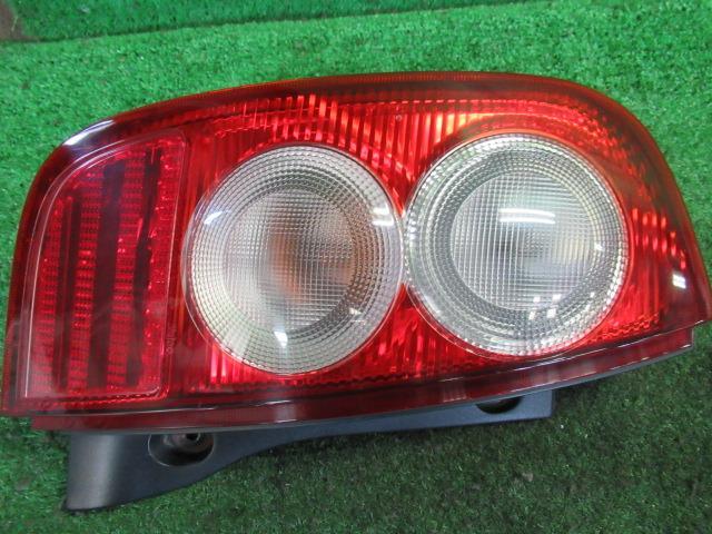 【中古】 ニッサン マーチ AK12 左テールランプ イチコー 4994 カラーナンバー KYO ダイヤモンドシルバー