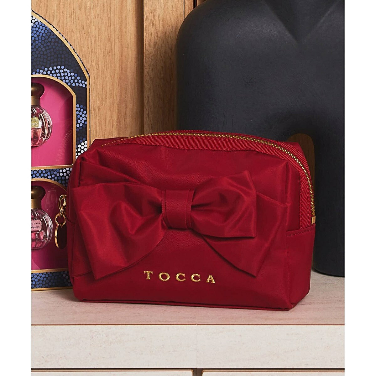 RIBBON KNOT POUCH |[` gbJ TOCCA 