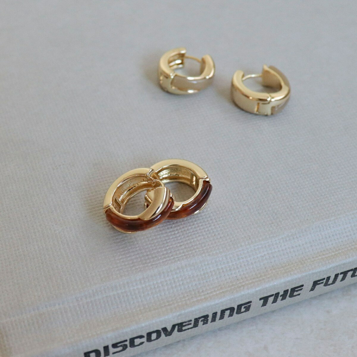 楽天丸井（マルイ）楽天市場店マーブルクロスワンタッチピアス／フレディエミュ（fredy emue）