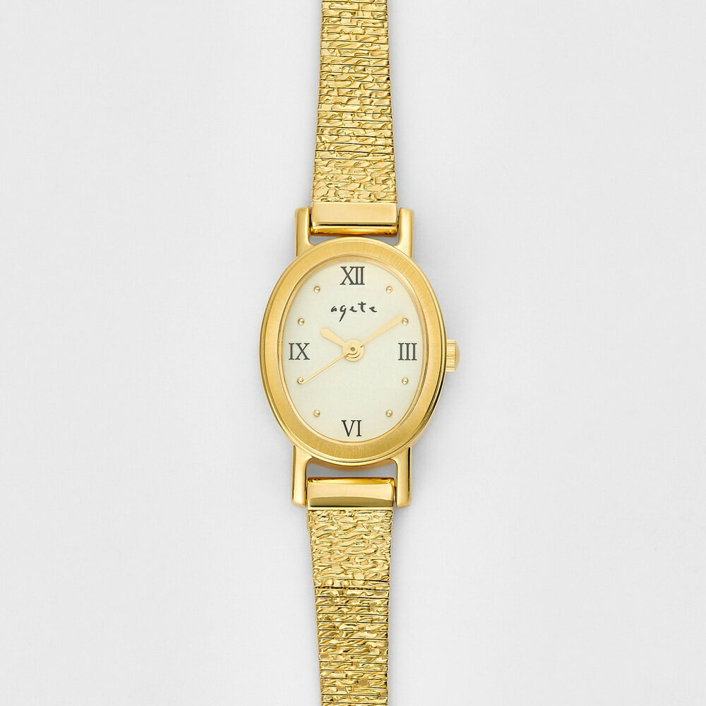 [型番：10254120802]しなやかな輝きが手元を彩る、オーバルフェイスウォッチ繊細なツヤ感が魅力の板巻きベルトが、ジュエリーのような上品さを演出する腕時計。日常の動作に美しく馴染みます。フェイスはほんのり縦長のオーバル型。女性らしい柔らかさと洗練された印象を兼ね備え、手元を上品に引き立てます。カラーは、幅広いスタイルやシーンに合わせやすい3色展開。自分らしい一本がきっと見つかります。＜価格改定のお知らせ＞ 2026年2月4日(水)より、素材の価格高騰に伴い価格改定を行います。商品タグに記載している価格につきまして、旧価格のものが混在している場合がございます。ご了承くださいますようお願い申し上げます。※板巻きベルトは構造上多少の隙間があります。※メッキを施してありますので、メンテナンスは研磨剤の入っていない柔らかい布をご使用ください。※時計に予め組み込まれている電池は、工場出荷時に機能や性能を確認する為のモニター用電池となっております。モニター用電池寿命による電池交換の場合につき、お買い上げより1年間無償となります。お買い上げ納品書と販売証明書と保証書はお手元にて保管いただけますようお願い申し上げます。◆ケース：ステンレス(ゴールドメッキ)◆裏蓋、リューズ：ステンレス(ゴールドメッキ)◆ベルト：ステンレス(ゴールドメッキ)◆風防：ミネラルガラス◆文字盤：真鍮■カラー：イエローケース(縦):2.75 ケース(横):1.7 ベルト幅:細0.6、太0.8 全長:20.5※(　)で表記されている数字はヌードサイズです。ヌードサイズとは衣服を身につけない身体のサイズです。お客様ご自身の身体サイズと比較してお選びください。 ■素材： ■お手入： &nbsp;&nbsp;>>商品のお取り扱い方法 ■原産国：オーバルフェイスウォッチ／ゴールド／アガット（agete）イエロー画面上と実物では、多少色具合が異なって見える場合がございます。