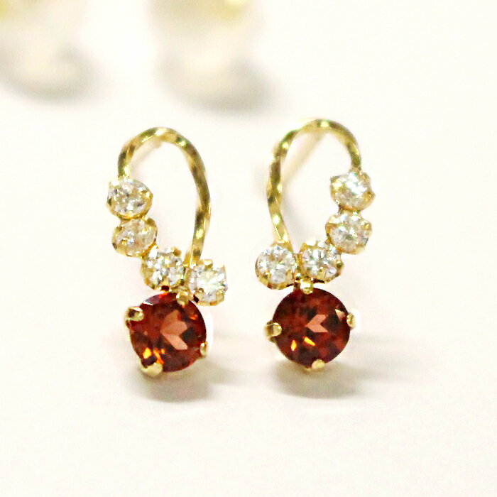 ピアス ガーネット ピアス 着けただけでスペシャル気分…！ ガーネットを大切に留めました。 くるくるラインにキュービックがキラリ K18 イエローゴールド ピアス 3月の誕生石 シンプル ゼント 18金 18K YG おしゃれ かわいい ラッピング無料
