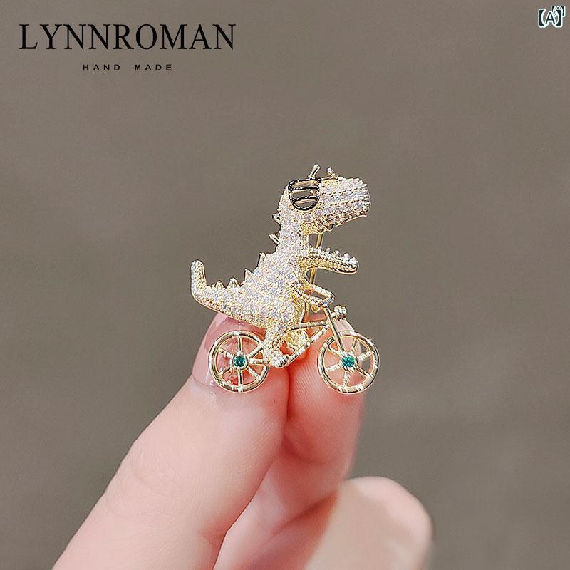 レディース アクセサリー　小物　かわいい　綺麗　ファッション　オシャレ LYNNROMAN 恐竜 自転車 ブローチ新 ピン セーター スーツ アクセサリー