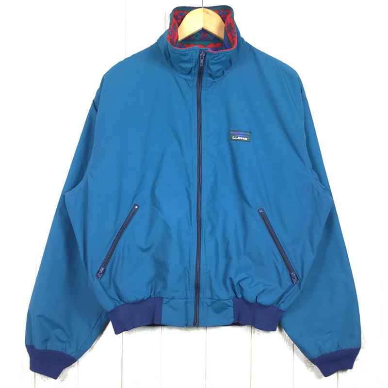 ■生産時期：1990年代 ■カラー： ブルー系■サイズ：MEN's M■サイズ備考：サイズ表記不明。実寸から推定。■実測値・身幅：64cm・裾幅：45cm・着丈：63cm・肩幅：54cm・袖丈：65cm・重量：515g※全て外寸です。また、手作業による採寸・簡易計測ですので誤差はご容赦下さい。■総合状態評価：7 使用感少ない美品 （10段階） ※襟タグ判読不可。※総合状態評価基準（当店スタッフの主観によるものであり、あくまで参考です。）10 新品・未使用9 新品・未使用：アウトレット・難あり8 中古：新品同様7 中古：使用感少ない美品6 中古：若干の使用感あり5 中古：使用感あり（通常の中古）4 中古：著しい使用感あり3 中古：非常に著しい使用感あり2 中古：機能上の問題あり1 ジャンク：致命的な問題あり・使用感：小（無/微/小/並/中/大/極） ※・汚れ：微（無/微/小/並/中/大/極） ※左ひじ付近に若干のスレ汚れ・傷：無（無/微/小/並/中/大/極） ※・褪色：無（無/微/小/並/中/大/極） ※・臭い：無（無/微/小/並/中/大/極） ※・経年劣化：無（無/微/小/並/中/大/極） ※■社内管理項目・商品コード：z00020428・受入担当者：・査定担当者：・撮影担当者：・出品担当者：W000#エルエルビーン #LLBEAN #LLビーン #MENs #Mサイズ C00_トップス C01_ジャケット C02_スタンドカラー C03_プルオーバー C04_長袖 C36_ハードシェル