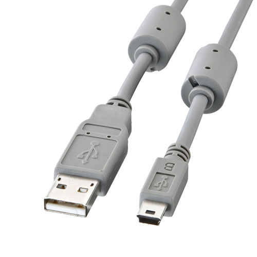 ミニUSBコネクタ対応のUSBケーブル　3m　フェライトコア付きUSBポートを持つパソコンとUSB(ミニUSB　Bコネクタ5pin)のインターフェースを持つ周辺機器(デジカメ、PSP、USBハブ、ハードディスク、カードリーダ、MP3プレーヤー、デジタルハンディカムなど)とを接続するケーブルです。 また、PictBridge対応のデジカメとプリンターを接続することもできます。 ※細径ケーブルを使用していますので、延長することはできません。 ※デジタルカメラ・デジタルハンディカムとパソコンを接続するには専用ソフトが必要な場合があります。 ※「PictBridge」とは、デジカメとプリンターを直接接続して印刷するための通信規格です。 各メーカーが独自に実装してきたダイレクトプリント方式を統一し、異メーカー、異機種間でのダイレクトプリントの互換性を確保します。PictBridgeに対応したデジタルカメラとプリンターなら、メーカーを問わずにダイレクトプリントが可能になります。 ●USB2.0の「Hi-SPEED」モード(転送速度480Mbps)に対応した高品質ケーブルです。USB1.1規格(転送速度12Mbps・1.5Mbps)の機器にも使用できます。 ●USB IF(USB Implementers Forum)で認証された製品です。 ●二重シールドケーブル 銅製の高密度編組みシールド材の内側に密閉型のアルミシールド処理を施し、低域から高域まで、ほとんどのノイズから大切なデータを守ります。 ●ツイストペアケーブル 芯線を2本ずつよりあわせたノイズに強いツイストペア線を使用しています。 ●モールドコネクタ 内部を樹脂モールドで固め、さらに全面シールド処理を施していますので、外部干渉を防ぎノイズ対策も万全。耐振動・耐衝撃性にも優れています。 ●金メッキピン 錆にも強く、経年変化による信号劣化の心配が少ない金メッキ処理を施したピン(コンタクト)を使用しています。 ●ノイズフィルター(フェライトコア)付き ケーブルから伝送されるノイズを効果的に吸収するノイズフィルターの機能を持つフェライトコアが装着されています。■ケーブル長:約3m SR間 ■ケーブル径:約4.2mm ■コネクタ形状:USBシリーズ Aコネクタオス-ミニUSBシリーズ Bコネクタオス(5pin) ■規格:USB2.0/USB1.1■送料 送料無料。但し、沖縄・離島を含む(一部配送不可地域)のご注文は配達不可のためキャンセルさせて頂きます。