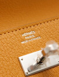 【新品未使用展示品】HERMESエルメスケリーウォレットロング二つ折り長財布シェーブルムタードシルバー金具A刻印【本物保証】【中古】