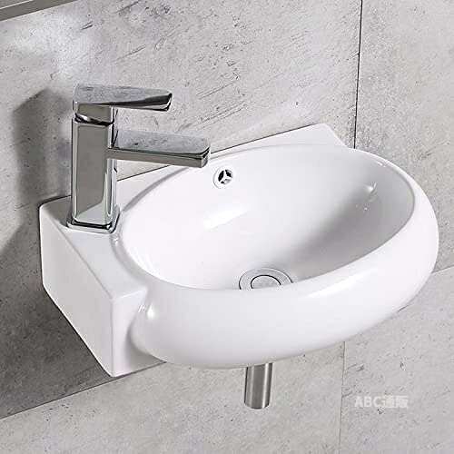 【壁付け型&省スペース】：手洗いボウルを壁に直接取付けるタイプです。洗面器としてはやや小ぶりですが、省スペース性に優れています。シンプルでコンパクトな洗面空間をつくることができるため、小さなトイレや狭い洗面所など、空間が限られている場所に使用できます。小型の部屋にぴったりと思います。 【規格&取り付け説明】：手洗い器サイズ：420*280*150mm、重さ：8kg、排水口径：45mm、蛇口の取り付け穴径：36mm、ドリルビットは12mmを勧めます。 形：エッグ（左）、この手洗台は和洋問わず、オフィス、図書館、喫茶店、飲食店、ホテル、洗面所、お風呂場など様々な所に合います。すっきりとした印象の洗面スペースをお望みの場合におすすめです。手洗い鉢と排水金具は設置が簡単なので、取扱説明書どおりに設置すればでいいです。おしゃれなデザインを与えています。 【ポップアップ式の排水金具付き】：普通の洗面ボウルと比べて、当社の手洗い器はポップアップ式の壁排水金具付いています。排水金具は高品質な銅製で、普通の排水金具より耐久性がずっと良いです。錆を出ることを心配する必要もありません。（注：蛇口は付属しておりませんので、お客様は自分で購入してください。） 【高品質&掃除しやすい】：弊社の手洗器は1280C以上の高温で焼き上げております。 伝統工芸とモダンのデザインを組み合わせる白い手洗ボウルは洗面所の全体が清潔でシャープな印象を残しやすいです。手洗器の表面には釉薬が採用して、滑らかで光沢があります。表面が滑らかで汚れが溜まりにくいので、サッとふくだけで、きれいになります。 【十年の安心保証】：壁掛け洗面ボウルは購入日から10年間の品質保証を提供します。弊社は生産と運営の豊富な経験を持っています。迅速で効率的なアフターサービスを確保するために専門のテクニカルサポート部門が設立されました。弊社は「すべては高品質の製品、お客様の満足のため」という信念を持っております。「最善の価格、至れり尽くせりのサービス、信頼できる製品の品質」の原則に基づき、洗面ボウルに問題がある場合は、迅速な対応ができますので、ご安心ください。