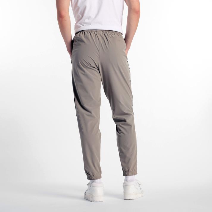 【New Balance】 ニューバランス M ウーブントラックスジョガーパンツ パンツ AMP51205DOK