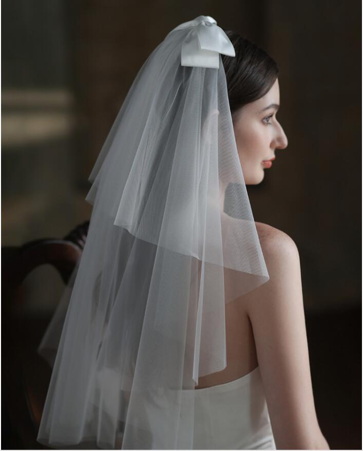 送料無料ベール ミドルベール 結婚式 ウエディング コーム付き 2層 ショートベール ウェディング 二層 可愛い リボン付き 髪飾り ミドル チュール ウェディングベール ウエディングベール 花嫁 被りベール アクセサリー アイボリー長さは約30cm、70cm*160cm
