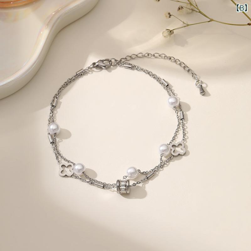 アクセルジャパンのブレスレット レディース チタン鋼 シルバー ゴールド 二連 チェーンブレスレット パール ジルコニア 花型 透かし彫り アクセサリー 重ね付け風 高見え おしゃれ かわいい 大人かわいい きれいめ 上品 華奢 細身 腕輪 普段使い お出かけ デート パー｜アングル2
