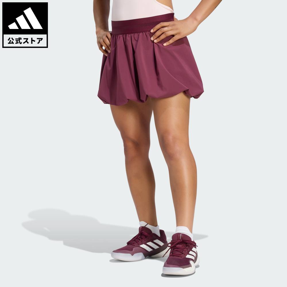 Brand：パフォーマンスSports：テニスCategory：ウェア・服【31cg】【color:バーガンディ】【size:S】 【size:M】 【size:L】 【size:XL】 【size:2XL】 スポーツブランドアディダス公式ショップテニス クライマクール バブル スカート プロテニス クライマクール バブル スカート プロは、90年代ニューヨークのナイトライフからインスパイアされたテニス用スカート。アイコニックなバブルシルエットと高機能生地を掛け合わせたデザイン。クライマクール搭載のウーブン生地が、涼しくドライな着心地をもたらす。さらに、動きやすさを追求したレギュラーフィットの作りと幅広の伸縮性のあるウエストバンドで、快適で安定感のあるフィット感を叶えている。インナーパンツ付きで快適さとテニスボール収納の利便性も兼ね備え、背面のウエストバンドにあしらったパフォーマンスロゴがこのコレクションのテーマを表し、シャープな印象を添えている。雑念の生まれる余地を与えない快適でスタイリッシュなスカートで、次のチャレンジに備えよう。クラシックデザインにモダンなアレンジを加えた、多目的スカート。爽やかな着心地が続く、クライマクールテクノロジー搭載のスカート。レギュラーフィット伸縮性ウエストバンド主素材：ポリエステル87%、ポリウレタン13%／インナーパンツ：ポリエステル85%、ポリウレタン15%／裏地：ポリエステル92%（ポリエステル100%使用）、ポリウレタン8%プレーンウィーブ構造パフォーマンスロゴ商品番号：KH1135色：Maroonモデル：V7906スポーツ：テニステクノロジー：クライマクールSizeウエストヒップSMLXL2XL62cm65cm71cm74cm80cm143cm146cm152cm155cm161cm総丈：29cm総丈：29cm総丈：33cm総丈：33cm総丈：34cm※ 上記の数値はそれぞれのサイズにおける製品の寸法を表しています。※ 商品によっては、表示の寸法から若干の誤差（1～2cm）が発生する場合があります。※ 同じサイズでも、製品の素材の特徴やデザインによって着用感が異なる場合があります。Other Color