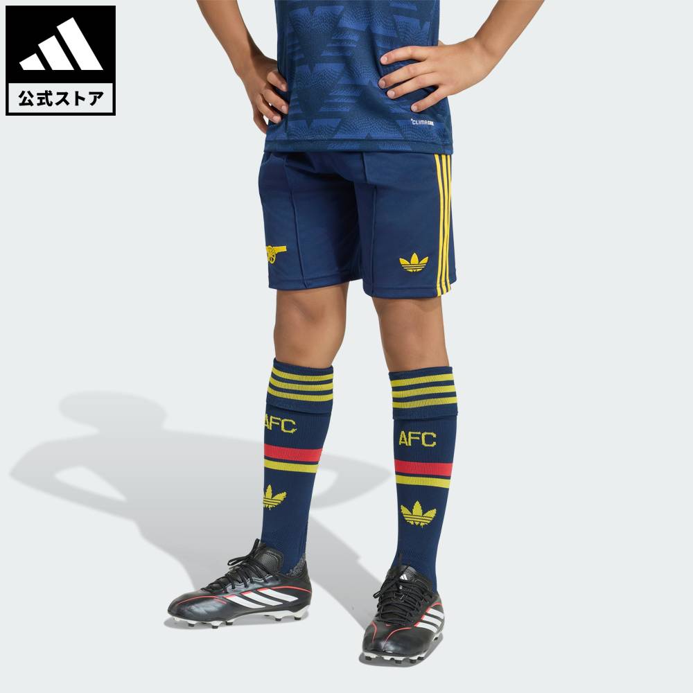 Brand：オリジナルスSports：サッカーCategory：ウェア・服【32cg】【color:ブルー】【size:130】 【size:140】 【size:150】 【size:160】 スポーツブランドアディダス公式ショップキッズ アーセナルFC 26/27 アウェイ ショーツ伝説的な「傷んだバナナ」デザインにインスパイアされたアーセナルFC 26/27 アウェイ ショーツは、若々しいエネルギーとクラシックなヘリテージを融合し、若いファン好みの鮮やかでモダンなスタイルの一枚。クライマクールテクノロジーで汗を発散し、涼しくドライな着心地を実現。速乾性のある生地が集中力を保つ。ソフトな構造とドローコードクロージャーで快適さとぴったりとしたフィット感をプラス。快適さを保ちながらチームへのサポートを示したいお子様にとって、このアディダスショーツはマストアイテム。アクティブな動きを想定してデザインされたこのアイテムなら、すぐに動き回れる。お子様を涼しくドライなコンディションに保つためのクライマクールテクノロジーを採用したショーツ。レギュラーフィットドローコードクロージャーポリエステル100%インターロック生地クライマクールテクノロジー商品番号：KB9960色：Collegiate Navyモデル：TB397・対象：ジュニア（8〜16歳）スポーツ：サッカーテクノロジー：クライマクールSizeウエスト股下股上ヒップ裾回り13014015016050cm55cm60cm64cm14cm16cm17cm19cm21cm23cm25cm26cm77cm83cm89cm95cm44cm47cm50cm54cm※ 上記の数値はそれぞれのサイズにおける製品の寸法を表しています。※ 商品によっては、表示の寸法から若干の誤差（1～2cm）が発生する場合があります。※ 同じサイズでも、製品の素材の特徴やデザインによって着用感が異なる場合があります。