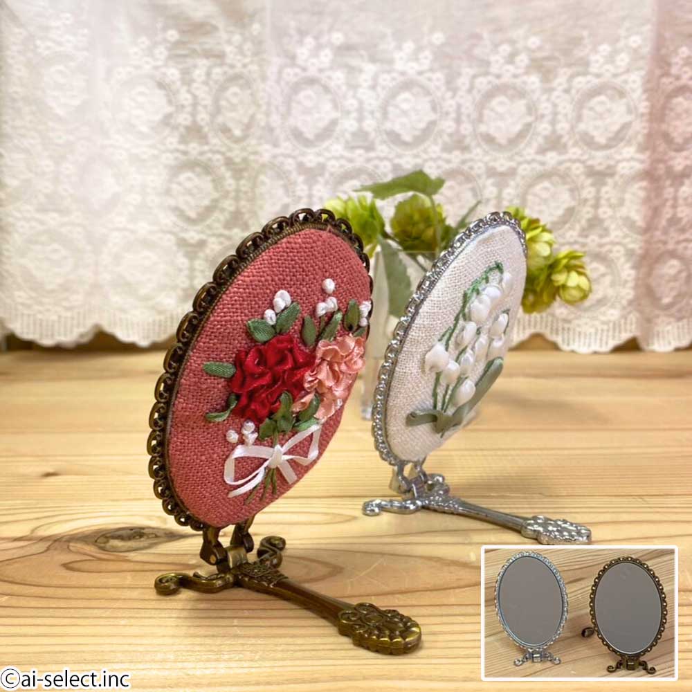 New 手鏡 ハンドミラー リボン刺繍 スズラン カーネーション 楕円 手持ち かわいい おしゃれ 化粧 直し 持ち運び 便利 携帯 コンパクトミラー メイクミラー 小さい 鏡 持ち運び スタンドミラー プレゼント 母 祖母 女性 ギフト オーバル型 かわいい 2way 巾着付き