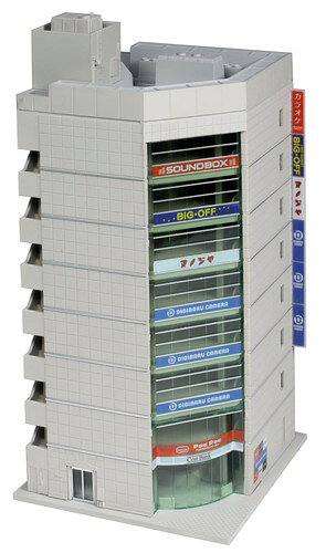 KATOのNゲージストラクチャー、テナントビル1 (グレー)です。 ユニトラム用に最適にデザインされた、完成品の大形ビルです。[TV1 ユニトラム基本セット]の建物スペースを、角ビル4棟を含む6棟で構成します。レイアウトシステム「ジオタウン」規格に準拠しているので、道路プレートへ置くだけでお手軽に街並みを再現できます。 エントランス・看板・ショーウィンドウなどは彩り豊かなシールで再現済。1階は店舗系の設定で繁華街の賑わいを演出します。屋上設備も的確に再現したほか、屋内の各フロアも構成していますので、窓の大きなビルではよりリアルなアレンジもお楽しみいただけます。