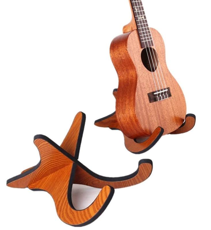 XSAJU ウクレレスタンド 木製 X型 折り畳み式 楽器ホルダー 保護クッション付き ウクレレ マンドリン バイオリン 用ウクレレ（ソプラ、コンサート、テナーを含む）、バイオリン、マンドリンのスタンドとして。滑らかな木目で高品質の木質材料製です。 Xフレームは装置を安定して支持するためのコンパクトな構造を提供します。接触面に滑り止めパッドを増やして、貴重な器具をより傷から守ります。取り外し可能なデザイン、組み立てと取り外しが簡単です。高さ：約15センチ 幅：約20センチ 奥行：約28センチ