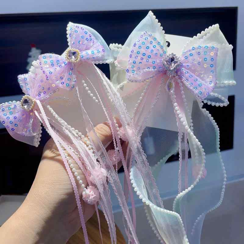 ・スタイル: 子ども用・処理工程: り・ヘアクリップ分類: ペアクリップ・デザイン要素: リボン、メッシュ・スタイル分類: 爽やか、フェミニン・カテゴリ: ヘアアクセサリー・対象: 子ども