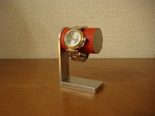 サイズ 長さ7.5cm、奥行き4.8cm、高さ10.8cm　パイプの径4.4cm 材　質 ステンレス、コルクシート 色 ステンレス部分：シルバー色 商品説明 ◎ハンドメイドのステンレス製腕時計スタンドです。 ◎ステンレスは丁寧にヘアライン＆サテン仕上げを施しておりますので大変綺麗です。 ◎コルクを貼っておりますので腕時計を傷つけません。またコルクは滑り止め加工済みです。 ◎大変重厚感のある仕上がりですので、お部屋のインテリアにも最適です。 ・お気に入りの腕時計を飾れます。