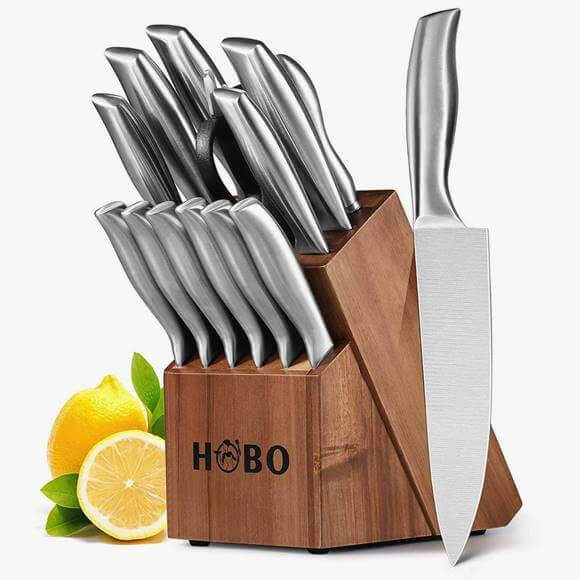 HOBO Knife Set,14-Piece Knives with Wooden Block, All-Purpose Kitchen Scissors and Sharpener Stainless Steel Chef Cutlery シェフナイフ（約20cm） ブレッドナイフ（パン切りナイフ）（約20cm） スライスナイフ（約20cm） ステーキナイフ　（約11.5cm）6本 ユーティリティナイフ（多目的包丁）（約13cm） 果物ナイフ（約9cm） シャープナー キッチンバサミ ナイフスタンド台(ウッド) 全重量：約3kg 全体サイズ：約35×58×80cm ＜関連ワード＞ アメリカンキッチンウエア— プロ料理 プロフェッショナル 高級包丁 調理道具 包丁 肉 魚 野菜 naihu スタイリッシュ カトラリー キッチンアイテム 包丁 デザインナイフ 職人包丁 お洒落なナイフ 三徳包丁 多目的包丁 ブレッドナイフ　パン切り包丁 果物ナイフ シェフナイフ 肉切り包丁 naihu houcyou Cutlery Knife Block ランドスケープナイフ 母の日 父の日 敬老の日 景品 新築お祝い 結婚お祝い 祝い ハロウィンパーティー クリスマスプレゼント ギフト プレゼント ホワイトデーキッチンナイフセット 包丁セット 14点セット キッチンバサミ シャープナー スタンド付 ステンレス HOBO Knife Set,14-Piece Knives with Wooden Block キッチンをお洒落に演出。毎日お料理が楽しいですよ♪ 2