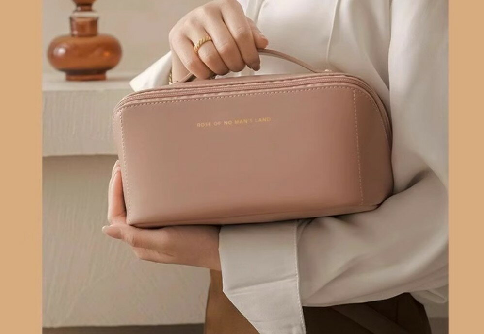 化粧ポーチ女性2025新型ポータブル大容量手提げ化粧ブラシ収納バッグハイエンドトラベル洗面バッグバッグ優雅シンプル