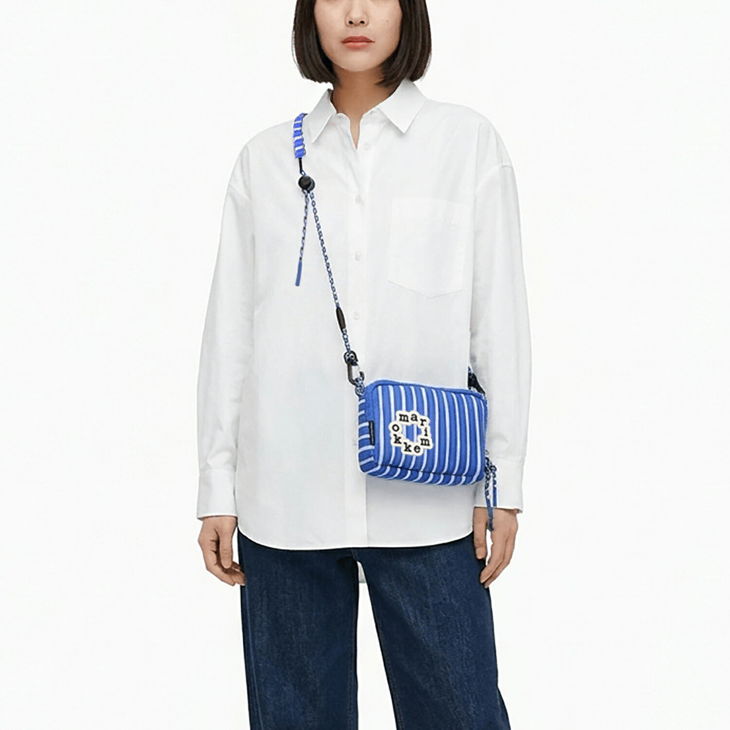 あおい　マリメッコショルダーピンク　セイディブラック　ディーンピンクL marimekko（マリメッコ）の「【kioski】Unikko / Funny Cross Pocket