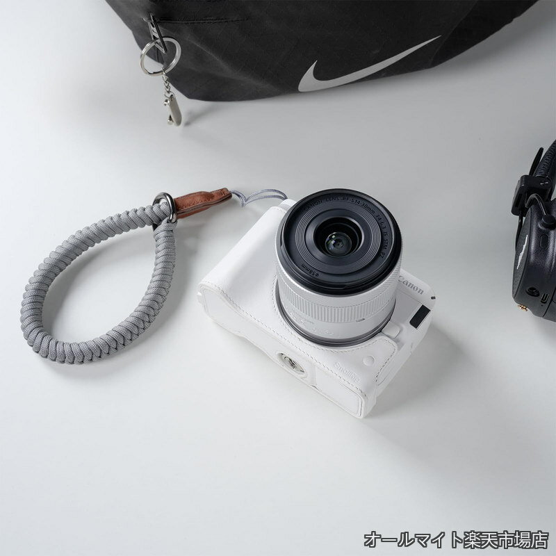 Rakuten - 【送料無料】Canonに対応R50 V用カメラレザーハーフケースキット ハーフレザーケースと編み込みリストストラップ付き 本革素材 持ち運びやすく保護力 （ホワイト） 5431