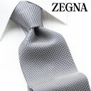 その他「エルメネジルド・ゼニア ネクタイ」はこちら SPEC ■ブランド：ERMENEGILDO ZEGNA（エルメネジルド・ゼニア） ■カテゴリ：ネクタイ ■品質：シルク100％ ■生地：ジャカード ■ベース：ライトグレー ■柄色：濃紺 ■柄：小紋 ■幅：80mm ■ネクタイの長さ：約145cm　※裁断の具合により多少の差異がございます。 ■MADE IN ITALY ※裁断により掲載写真と柄の出方が異なる場合がございます。あらかじめご了承ください。 ※メーカーの都合により裏生地の柄は変更になる場合がございます。商品画像は一例になります。 ※専用ブランドケースにお入れしてお届けします。 ※ケースは付属品になります。 ※ブランド専用手提げ袋やブランド専用ラッピングのご用意はございません。 ※入荷時期によりケースのデザインやカラーが写真と異なる場合がございます。 ※ケースのデザインをお選びいただくことは出来ませんのでご了承ください。