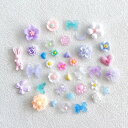 DUOLEIMI 夜光 ネイルパーツ 花 星 蝶々 種類豊富 100pcs リボン ネイルデコレーション 3D 立体 アクセサリーパーツ レジン用 DIY ジュエリーパーツ (夜光彩色系)