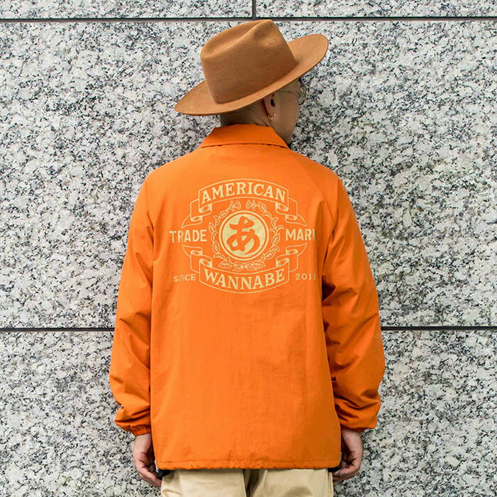 AMERICAN WANNABE アメリカンワナビー / 「TRADE MARK COACH JACKET / ORANGE」コーチジャケット / MEN'S メンズ / プリント / ナイロン / ロゴ / 長袖 / 防寒 / カジュアル / ストリート / アメカジ / オレンジ