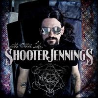 2013/3/12 発売輸入盤レーベル：ENT. ONE MUSIC収録曲：(シュータージェニングズ)Make no mistake about it, Shooter Jennings has never been one to allow expectations, boundaries, genre or ideals dictate the direction of his art. From the moment he burst onto the scene, it was clear that he had a style and a vision all his own that would separate him from the leagues of cookie-cutter artists out there. As an album, THE OTHER LIFE sees Shooter using all the colors of the pallets of previous recordings, and bringing them together to make his most diverse and interesting album to date.