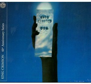 2013/12/17 発売輸入盤収録曲：(キングクリムゾン)USA is a live album recorded towards the end of King Crimson's final US tour of the 70 s in June 1974. It was issued as an epitaph for the band in Spring 1975 as a single album. Its critical reputation grew immeasurably in the intervening years to the point where a review of the 21ST CENTURY GUIDE TO KING CRIMSON boxed set in 2004 identified the album as the point "...where Fripp maps out the guitar blueprint for the entire post-punk movement". Includes a bonus DVD which features Hi-Res stereo versions of the three different album mixes: expanded 30th anniversary edition, Ronan Chris Murphy mix & previously unreleased Robert Fripp/David Singleton mix.