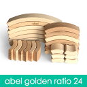 対象年齢 　 素材 　木 メーカー 　abel/エイベル社 弧を描く積み木 【abel/ エイベル】 abel golden ratio エイベルゴールデンレシオ24は様々なサイズのピースが24ピース入っています。 abelのブロックの中では、テーブルの上でも遊びやすいミニサイズとなっており、様々なサイズが入った柔軟性の高いセットになります。 エイベルのラインナップでは、大きく分けると「基本サイズ」「ミニサイズ」に分けられますが、当製品は「ミニサイズ」になります。 ずっしりとした基本のエイベルブロックとは大きさが随分異なり、軽く扱いやすいミニサイズ。 そしてそのミニサイズの中で、4種類のかたちが入ったものがこの「golden ratio / ゴールデンレシオ」です。 ゴールデンレシオとは黄金比のことで、それぞれピースの寸法はとても組み合わせしやすいように計算されているということです。 4種のカーブを描く弧は、まるで水を得た魚のように様々な作品を作ることができるはずです。 abel blocksは一般的な積み木とは見た目にも違いますが、遊んでみても違いが多くあります。 積むというより、並べる、重ねるという表現が近く感じます。 他のブロックでは円を2分割にした半円状のものなどはいくつかありますが、 エイベルは円を6分割にしたピースなので、緩やかで自然なカーブとして使うことができます。 この緩やかなカーブが心地よく、何かを描くように表現してみたくなります。 ゴールデンレシオでは、その円の大きさが4種類になります。 こういった特徴的なブロックは、その特徴ゆえに他玩具と組み合わせにしくいというものもありますが、 エイベルブロックスは緩やかなカーブなので、一般的な積み木や他のブロックなどとも組み合わせしやすく、遊びが広がりやすいのも特徴のひとつ。 直線や四角だけで表現していた積み木の作品に、曲線が入るだけでとても豊かになります。 きっと、様々な遊びの場面で活躍するはずです。 エイベルゴールデンレシオは24ピース、48ピース、96ピースというラインナップ。 悩ましいのはいくつのピースにするか。 まず、ゴールデンレシオのパーツはとても小さいパーツもあるため、ブロック数のイメージより実際は少なく感じるかもしれません。 これはエイベルの基本サイズをお持ちの場合、基本サイズはとても大きいのでそのボリュームの違いに驚くかもしれません。 でも、ミニサイズだからこそできる楽しい表現の遊びがあります。 それを踏まえ、24ピースはお試し用、または追加用として捉えることをお勧めします。 例えば24ピースだけでは作れるものが限られることで、エイベルブロックの楽しさは十分に感じられないかもしれません。 そのため、初めて遊ぶ場合は48ピースをお勧めします。 96ピースが必要かというと、もちろん沢山あればあるほど遊び方は幅広くなりますが、 48ピースを様子を見ながら追加しても、そんな割高にはならない価格構成となりますので48ピースがお勧めです。 【内容】24ピース入り 【サイズ】125mm x 24mm / 77mm x 24mm / 48mm x 24 / 30mm x 24mm 【メーカーからのおことわり】 材料には主に木材が使用されていますが、「節」や「濃筋」は木材が自然である証拠です。 これらは製品の表面に見て触れることができるものもあります。 木には赤太（色の濃い部分）と白太（色の薄い部分）があり、カット部分によっては違う木材に見えるような場合もあります。 これらを不完全であるという見方もありますが、これら全てを含んだものがabelです。 そのため、不完全なものも良品となります。 この点を含め、商品画像を全てご確認頂いたうえでご購入手続きをお願い致します。