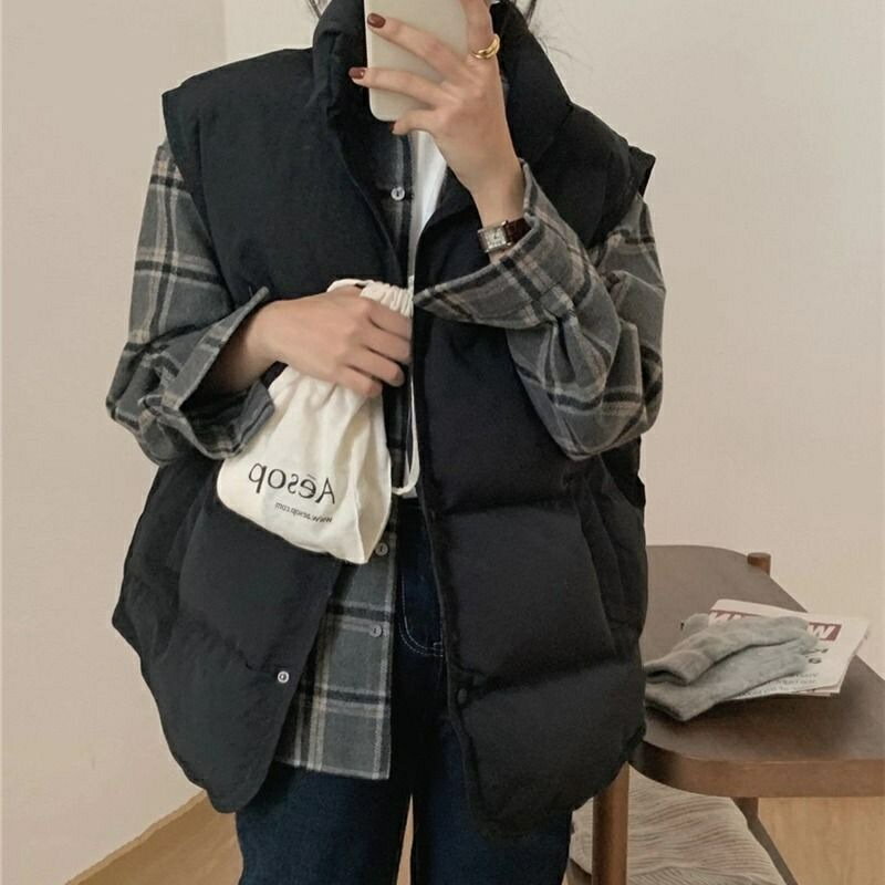 樂天商城 - レディース 綿入れ ベスト 立ち襟 冬 キルティングベスト 前開き 冬ベスト 防寒 あったか 羽織り ノースリーブ ハイネック シンプル カジュアル トップス 秋冬 ダウンベスト 軽量 通勤 普段着 無地 20代 30代 40代 送料無料