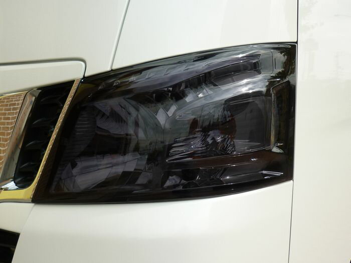 Rakuten - NV350キャラバン前期専用 ヘッドライトカバー ダークスモーク 左右セット D42-013