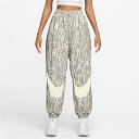 送料無料 ナイキ ウィンドブレーカー ロングパンツ レディース NIKE ウーブン プリンテッドパンツ オーバーサイズ アニマル柄 ジョガーパンツ 軽量 はっ水...