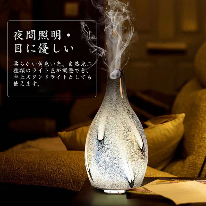 商品説明【花瓶デザイン】：特別な花瓶型設計、加湿の当時に、リラックスな雰囲気を醸し出します。リビングや棚の上で意外と存在を主張するアイテ厶だからこそ、インテリアのように楽しめるとうれしい。お花を飾りたくなる、花瓶のような凜とした佇まい。美しい曲線を活かしスタンダードに仕上げたボディは、どんなお部屋に置いてもしっくりと馴染んでくれます。【超音波式】：静かな超音波で湿潤細霧を吹き出し、蒸気が熱くならないので火傷の心配もありません。エッセンシャルオイルを入れる事で香りが広がり、リラクゼーション効果にも期待が持てストレス解消に繋がります。動作中に静音で仕事や眠れに邪魔しません。オフィスとリビングや寝室などに最適です。【空焚き防止】：時間設定機能や自動停止機能が搭載。水が無くなると自動的に電源をが切れる安全設計。お年寄りやお子様のいらっしゃるご家族にも安心してご使用いただけます。また、連続モードと間欠モードが付き、お好みのモードが選べます。乾燥花粉症解消部屋の乾燥やお肌のトラブルから守ります。【夜間照明】：柔らかい黄色い光、自然光二種類のライト色が調整可能、お好みとシーンに合わせて調節してみて下さい。卓上スタンドライトとしてもオススメです?　記念日や誕生日の贈り物、ご両親へのプレゼントに最適です。【ご注意事項】＊ご注意なのは、本製品は油性のアロマは使用できません。タンクの水は、雑菌などの繁殖を防ぐために毎日新しい水と入れ替えてください。メーカー希望小売価格はメーカーカタログに基づいて掲載しています商品説明【花瓶デザイン】：特別な花瓶型設計、加湿の当時に、リラックスな雰囲気を醸し出します。リビングや棚の上で意外と存在を主張するアイテ厶だからこそ、インテリアのように楽しめるとうれしい。お花を飾りたくなる、花瓶のような凜とした佇まい。美しい曲線を活かしスタンダードに仕上げたボディは、どんなお部屋に置いてもしっくりと馴染んでくれます。【超音波式】：静かな超音波で湿潤細霧を吹き出し、蒸気が熱くならないので火傷の心配もありません。エッセンシャルオイルを入れる事で香りが広がり、リラクゼーション効果にも期待が持てストレス解消に繋がります。動作中に静音で仕事や眠れに邪魔しません。オフィスとリビングや寝室などに最適です。【空焚き防止】：時間設定機能や自動停止機能が搭載。水が無くなると自動的に電源をが切れる安全設計。お年寄りやお子様のいらっしゃるご家族にも安心してご使用いただけます。また、連続モードと間欠モードが付き、お好みのモードが選べます。乾燥花粉症解消部屋の乾燥やお肌のトラブルから守ります。【夜間照明】：柔らかい黄色い光、自然光二種類のライト色が調整可能、お好みとシーンに合わせて調節してみて下さい。卓上スタンドライトとしてもオススメです?　記念日や誕生日の贈り物、ご両親へのプレゼントに最適です。【ご注意事項】＊ご注意なのは、本製品は油性のアロマは使用できません。タンクの水は、雑菌などの繁殖を防ぐために毎日新しい水と入れ替えてください。メーカー希望小売価格はメーカーカタログに基づいて掲載しています