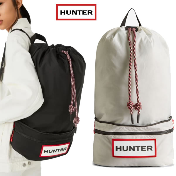 HUNTER バックパック Travel Ripstop Recycled Nylon 2Way Backpack UBB1519NRS 定価：　￥18,000（税抜き） 用途の広さを誇るトラベルリップストップパッカブルバックパックは、クロスボディのバムバッグからバックパックに変身する多機能デザインが特徴的です。ストラップは長さ調節が可能。ジッパー付きのサイドポケットには、お出かけや旅行の必需品を簡単に収納できます。リップストップ生地ならではの防水性と耐久性を持ち合わせているため、デイリーユースはもちろんのこと、ハイキングなどのアウトドアにも最適です。 ビーガン認定 耐水性リップストップ（引き裂きに強い）リサイクルナイロン バックパックもしくは折りたたむことでクロスボディにもアレンジが可能 長さ調節可能なナイロンウェビングストラップ 調節ができるドローコードのトップライン アクセスが簡単な貴重品入れに適したジッパー付きサイドポケット ハンターボックスのPVCロゴ アクセスが簡単なループジッププラー 高さ55cm、奥行き15cm、幅51cm、容量15.9L ☆予めご了承下さいませ☆ ◆ 在庫システムのデータ反映タイムラグ等により、まれにご注文商品が欠品している場合がございます。 ◆ お使いのパソコンやモニターの環境により、色に違いが 出ることがあります。