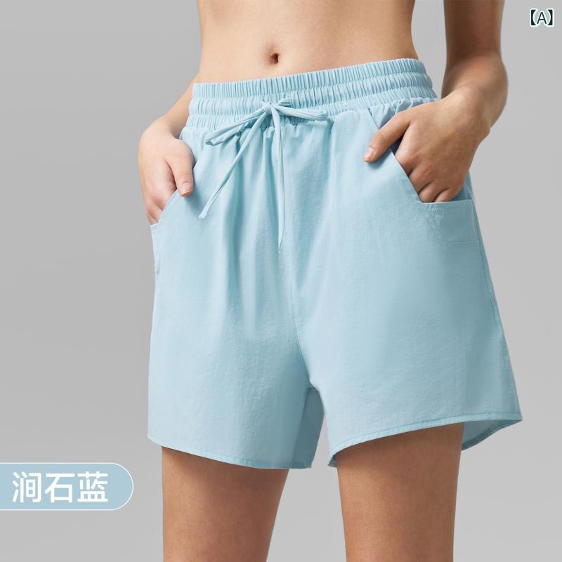 レディース ヨガ ショートパンツ 防光 2025 春夏 速乾 運動 短パン 女性用 ワイド ポケット フィットネス ランニング ジム トレーニング 吸湿排汗 ナイロン ポリエステル ミックス ミッドライズ ルーズフィット 涧石 藍 氷河 灰 星空 黒