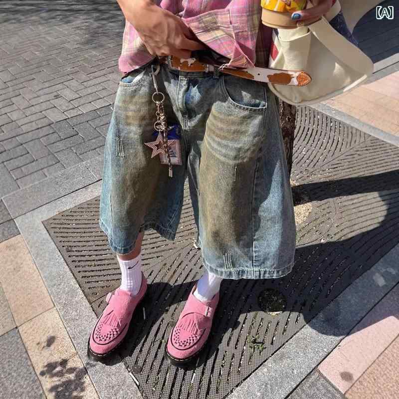 ・スタイル: ストリート・デザイン: ストレートパンツ・シルエット: ルーズ・特殊加工: ウォッシュ加工、ダメージ加工・パンツ丈: 7分丈・ウエスト: ハイウエスト・生地の厚さ: 薄手・誤差範囲: 5-10%・対象: 青少年・素材: 綿・主な素材の含有量: 30-50%・着用シーン: カジュアル・デザイン詳細: マルチポケット・伸縮性: 微伸縮・裾のスタイル: ストレート・カラー展開: ブルー・サイズ展開: S、M、L、XL、2XL、3XL・製品カテゴリ: デニムパンツ