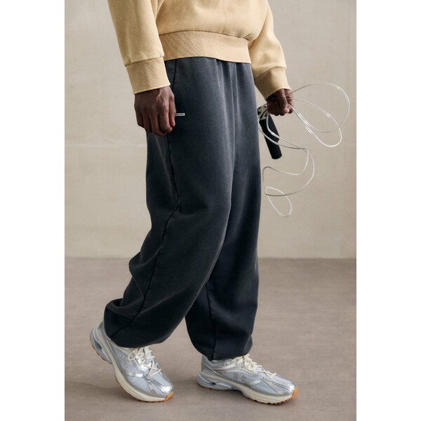 アンダーアーマー メンズ カジュアルパンツ ボトムス ICON WASH PANT - Tracksuit bottoms - black/white