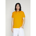 トミー ヒルフィガー メンズ Tシャツ トップス MONOTYPE UNDERCOLLAR - Polo shirt - rich ochre