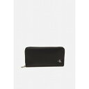 カルバンクライン カルバンクライン レディース 財布 アクセサリー BLOCK ZIP AROUND - Wallet - black