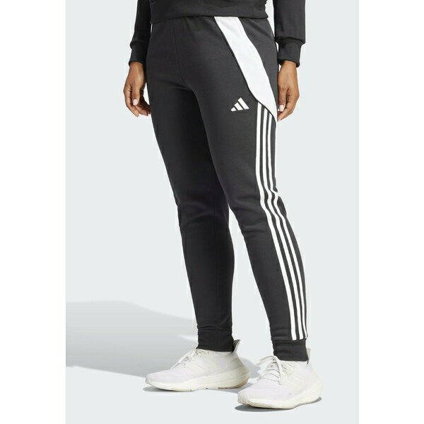 アディダス レディース フィットネス スポーツ TIRO24 - Tracksuit bottoms - black/white