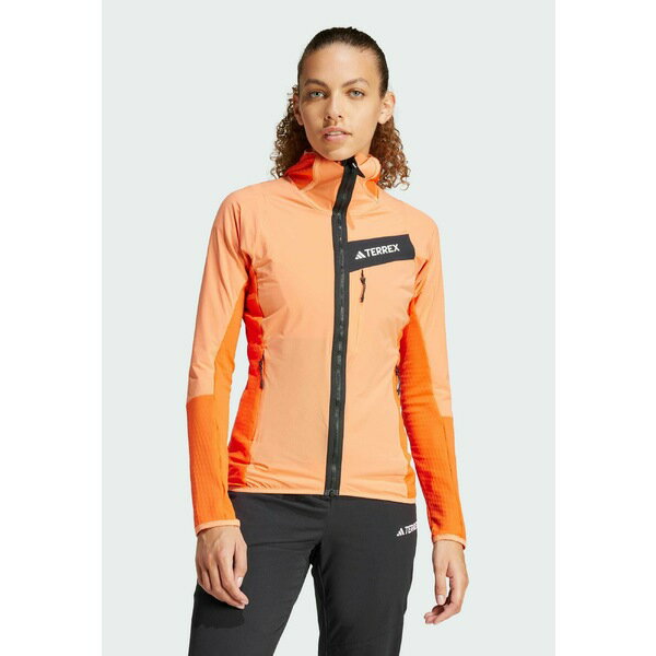 アディダス テレックス レディース フィットネス スポーツ TECHROCK - Fleece jacket - semi impact orange amber tint