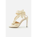 XL[m fB[X T_ V[Y CLOUD WITH HANDLE AND PADLOCK - High heeled sandals - beige