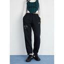 ジョーダン レディース カジュアルパンツ ボトムス PANT - Tracksuit bottoms - black/legend sand