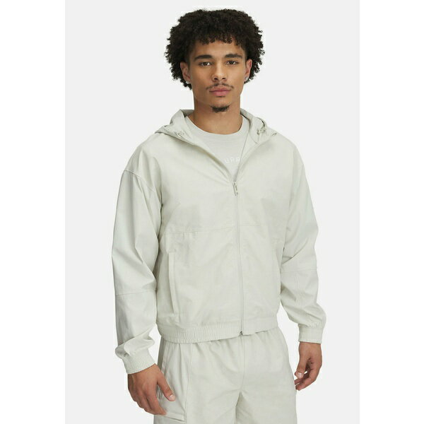 アンダーアーマー メンズ ジャケット&ブルゾン アウター CURRY WOVEN - Training jacket - summit white