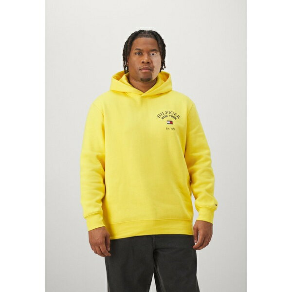 トミー ヒルフィガー メンズ パーカー・スウェットシャツ アウター ARCHED VARSITY HOODY - Hoodie - eureka yellow